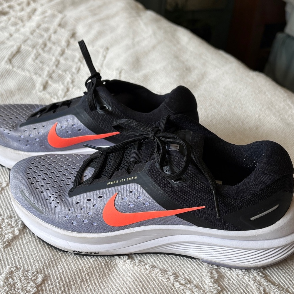 Nike Black and Lavender Sneakers with Vibrant Orange Logo